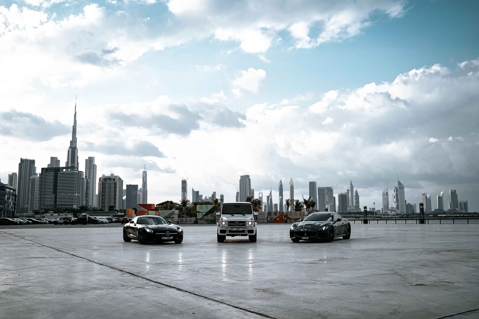 Premium vehicles used for MHA Carlift Service with Dubai skyline
